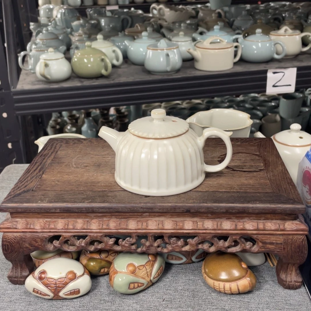 瓷片月白釉支烧青莲壶