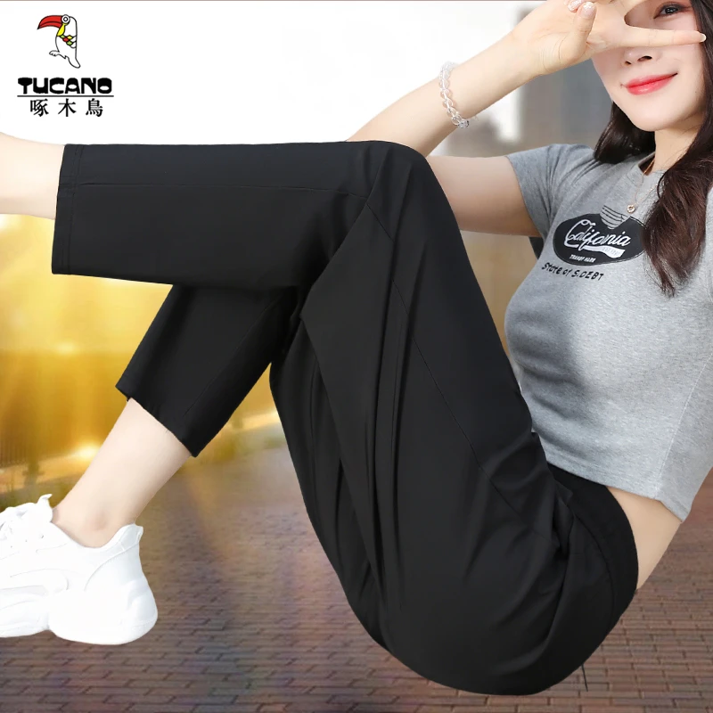 啄木鸟冰丝裤子女夏季爆款2025新款女士九分休闲裤宽松薄款运动裤