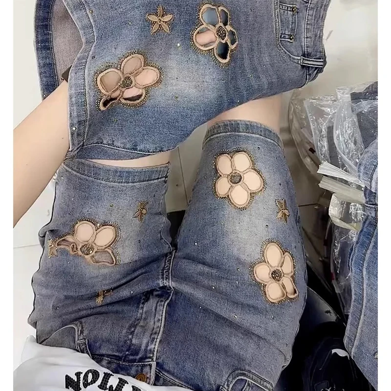 2025夏季蓝色镂空刺绣高腰弹力牛仔短裤大码女装显瘦直筒五分裤子