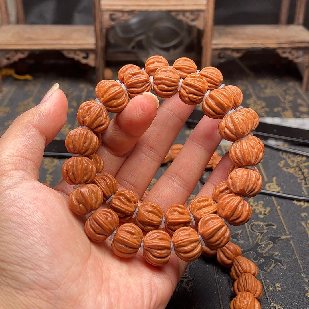 吊坠桃核佛手手串