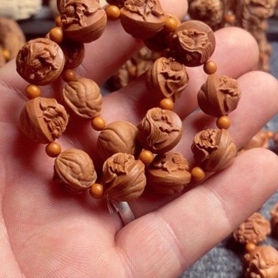 文玩核桃手串中***量龙纹桃核金鱼手串18颗子
