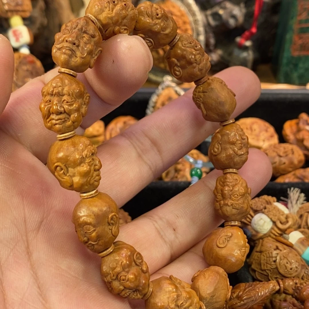 罗汉串潍坊核雕桃核雕刻