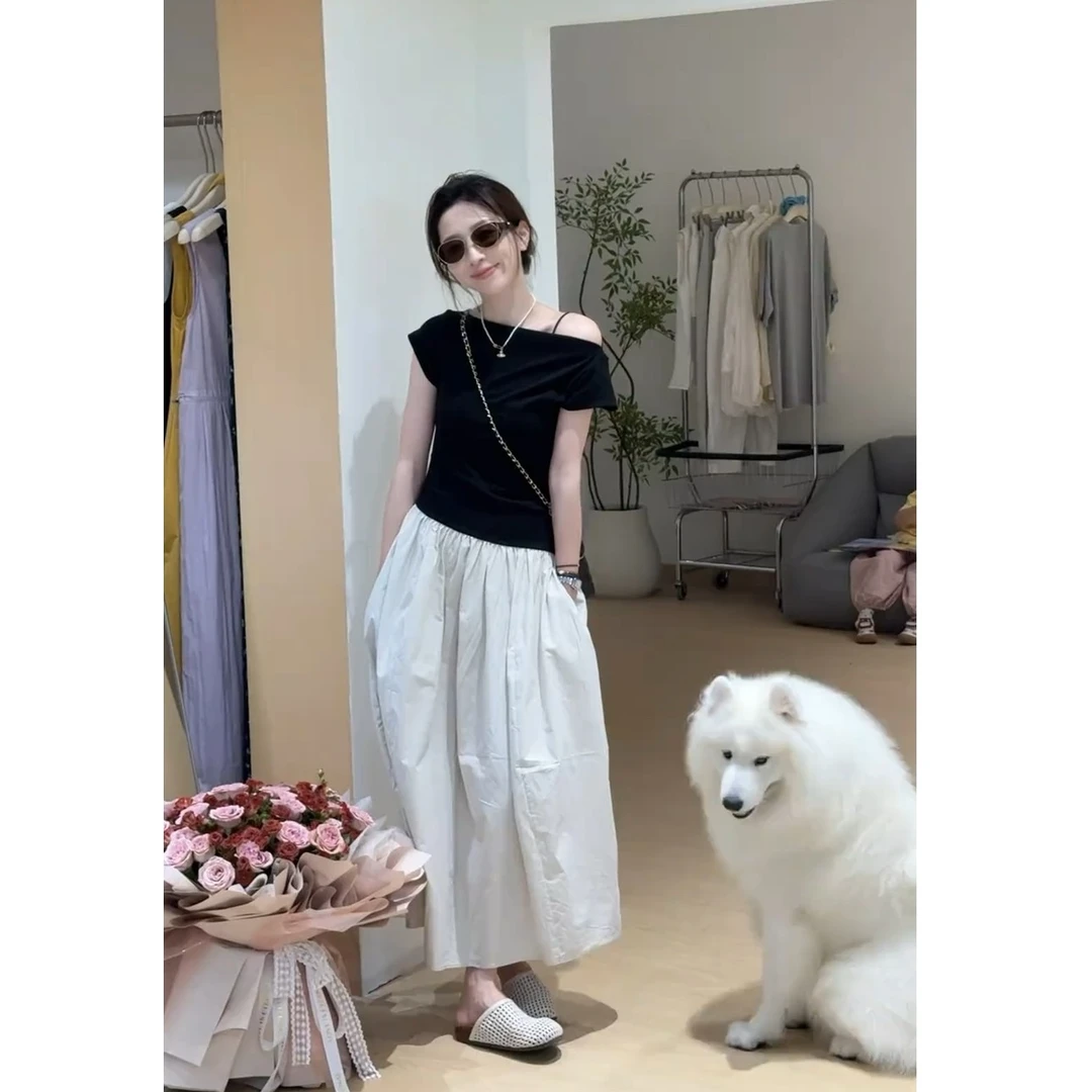 2025夏季新款法式设计感小众拼接一字肩短袖收腰显瘦连衣裙子女潮