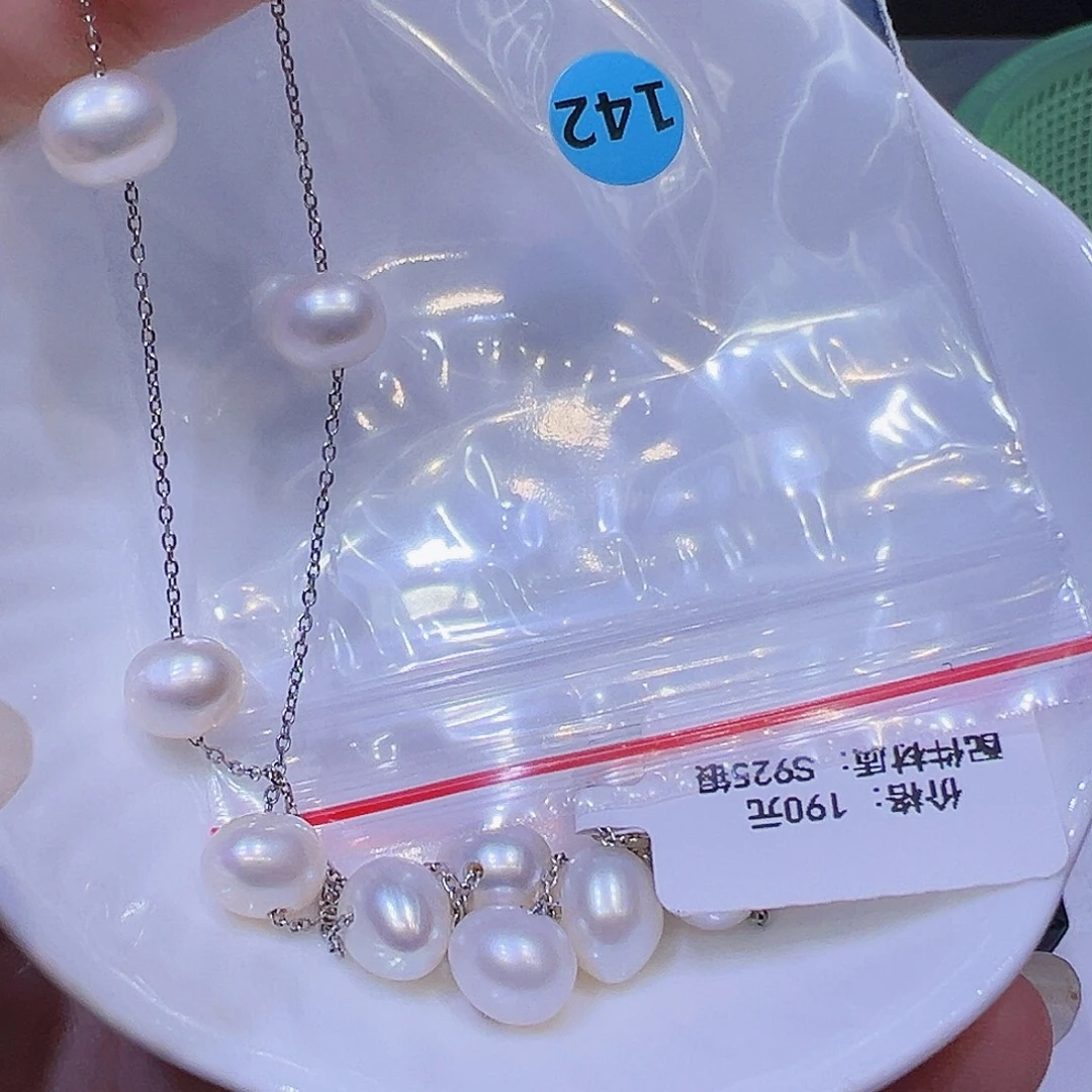 淡水珍珠银S925镶嵌耳饰