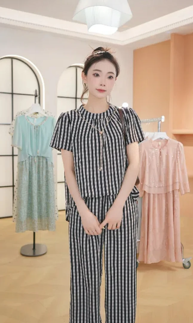 X夏季女装新款黑白时髦洋气显瘦清凉上衣阔腿裤气质两件套装