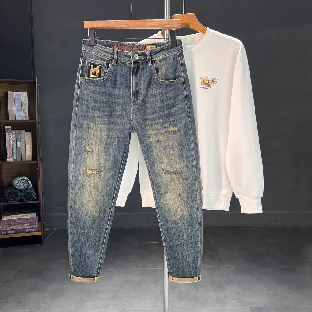 割烂补丁秋冬新款2025简约弹力男士合体水洗小脚牛仔裤裤子男长裤