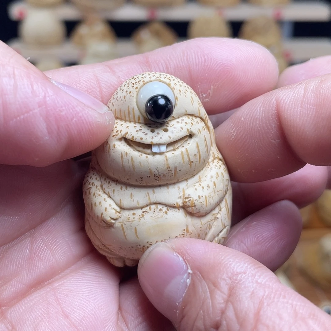 竹竹根雕独眼手把件