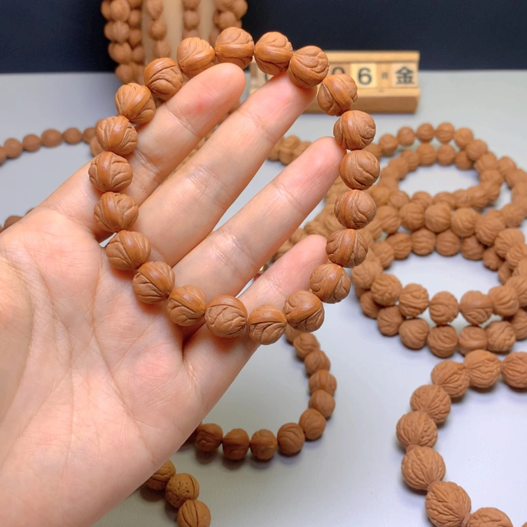 桃核吊坠叶*ʸ12玉龙脊手串