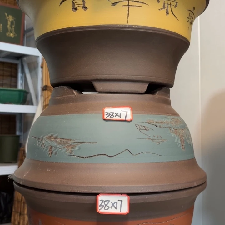 紫砂花盆100-3。