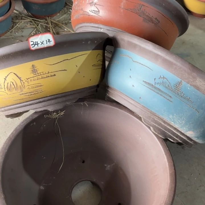 紫砂花盆100-4。      34-14