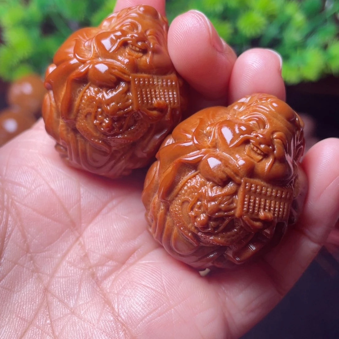 【闪购商品】橄榄核把件35左右龙财手球