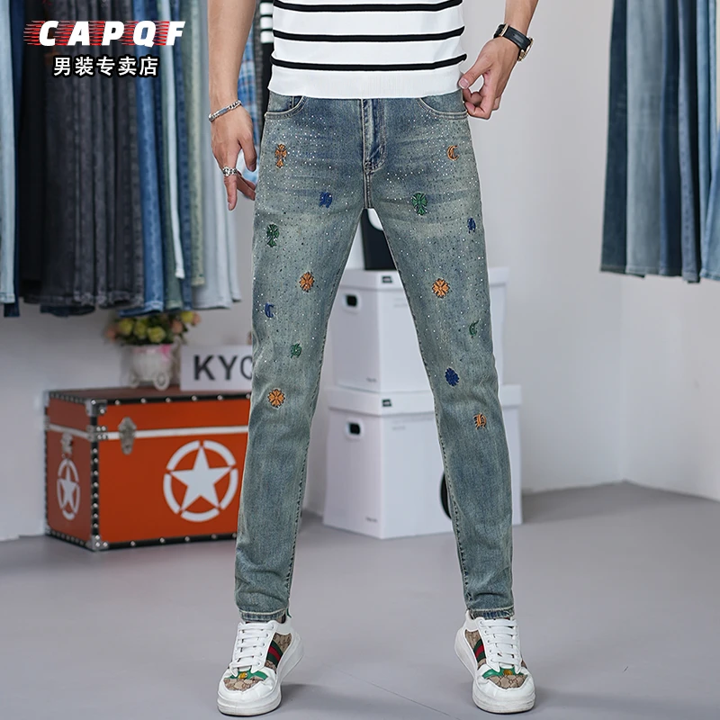 2025夏季新款刺绣牛仔裤男款潮牌复古烫钻弹力蓝色修身小脚休闲裤