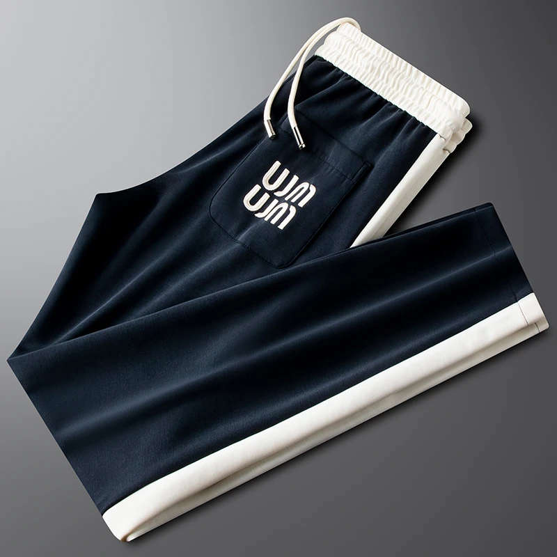 轻奢高级感莫代尔休闲裤男款夏季薄款空气层拉链口袋直筒运动卫裤