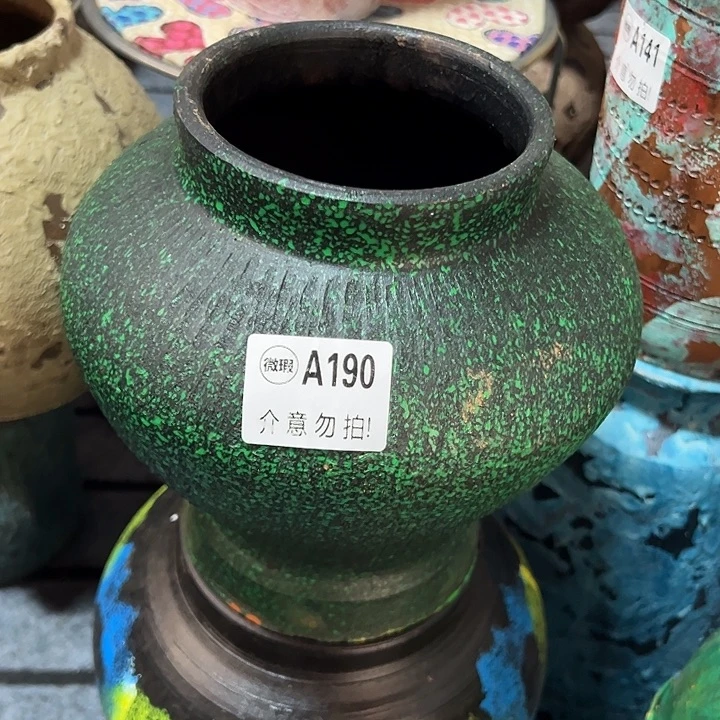 瑕疵底部窑裂有孔高20口11