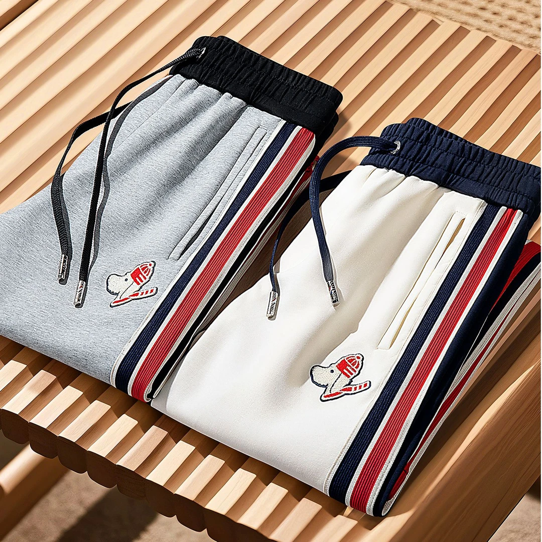 秋冬时尚个性刺绣休闲裤撞色织带拼接面膜空气层男士运动直筒卫裤