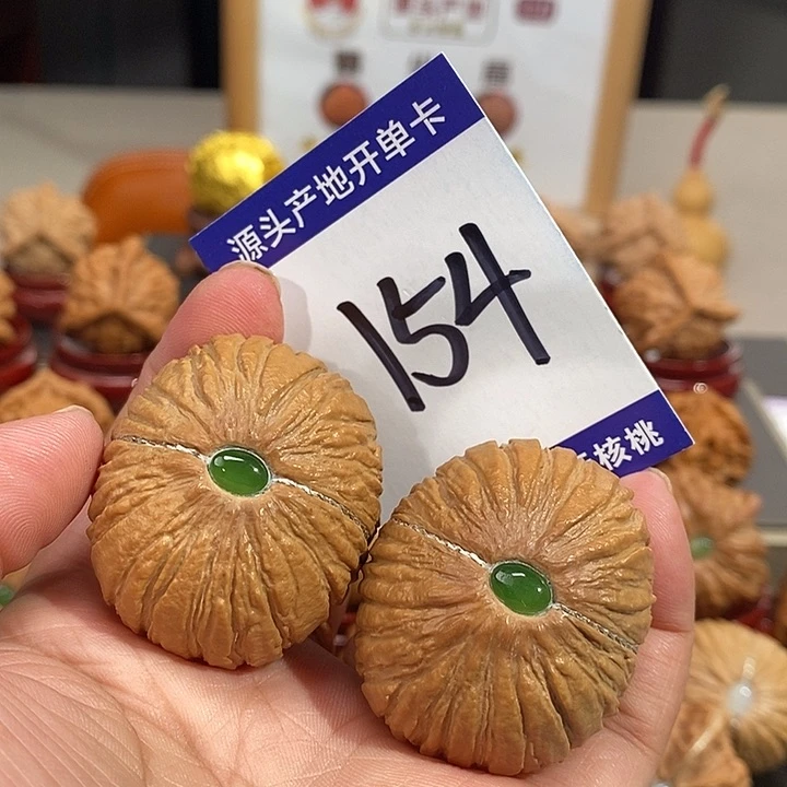 ****方文玩核桃把件41银镶玉猴头元宝154号