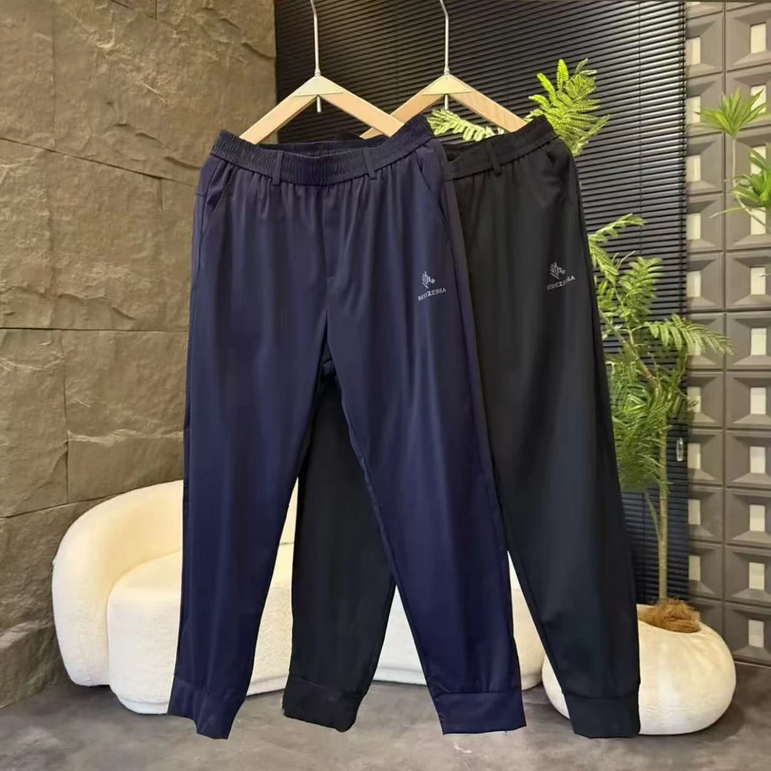 夏季薄款冰丝网眼透气休闲裤男时尚潮流宽松百搭束脚裤速干运动裤