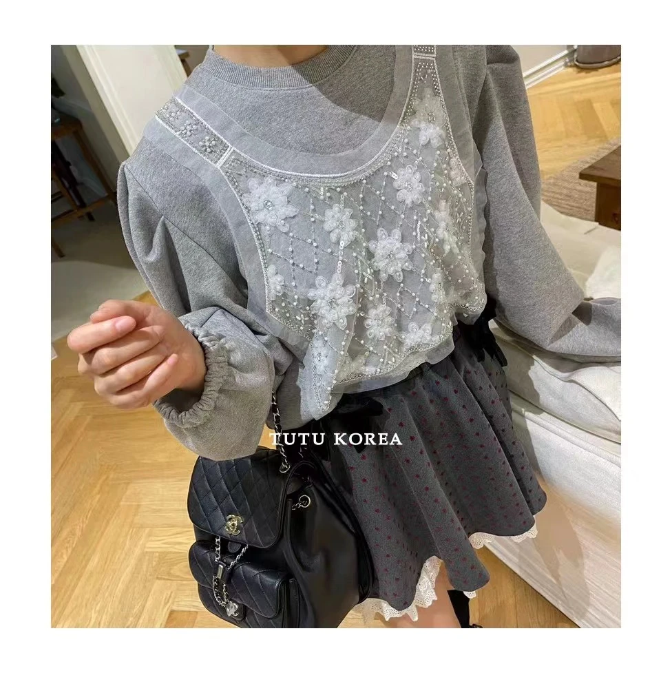 （重工钻花花）韩国拼接蕾丝蝴蝶结薄绒卫衣泡泡袖假两件上衣7034