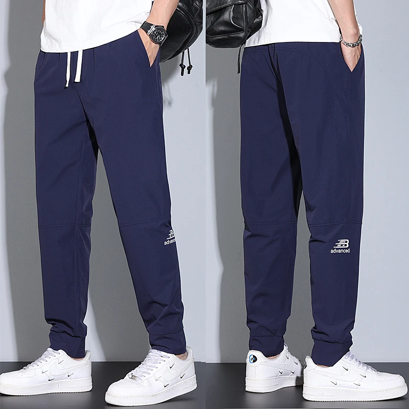 运动休闲裤男2025新款宽松束脚潮流卫裤百搭时尚透气简约男款长裤
