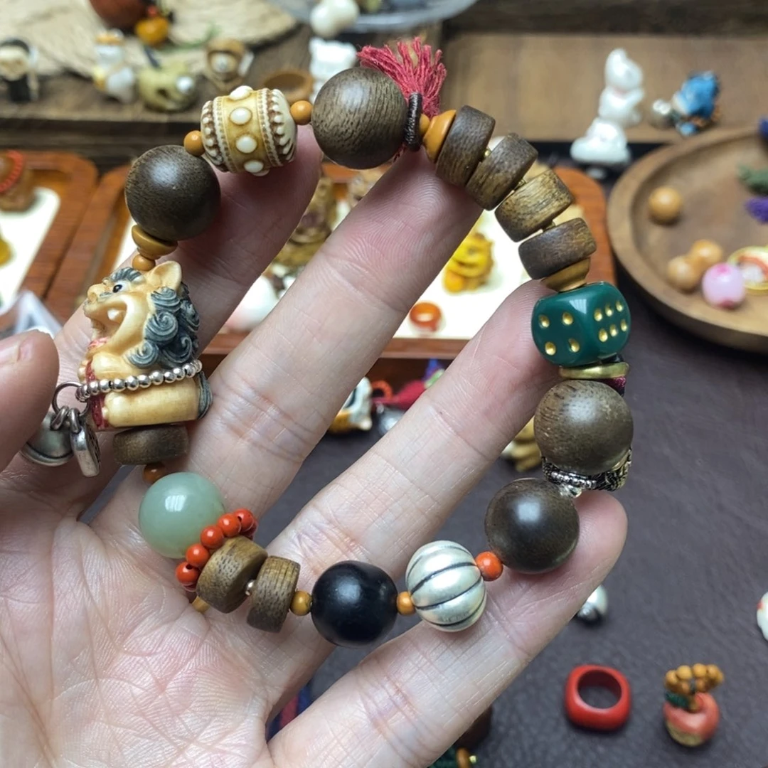 橄榄核手串曾**人橄榄核吞金兽