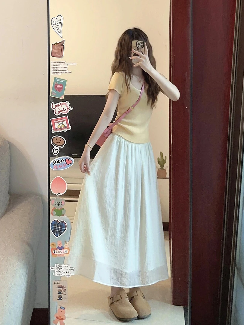 夏季2025黄色针织衫高腰a字半身裙女显瘦大摆裙小众裙子两件套装