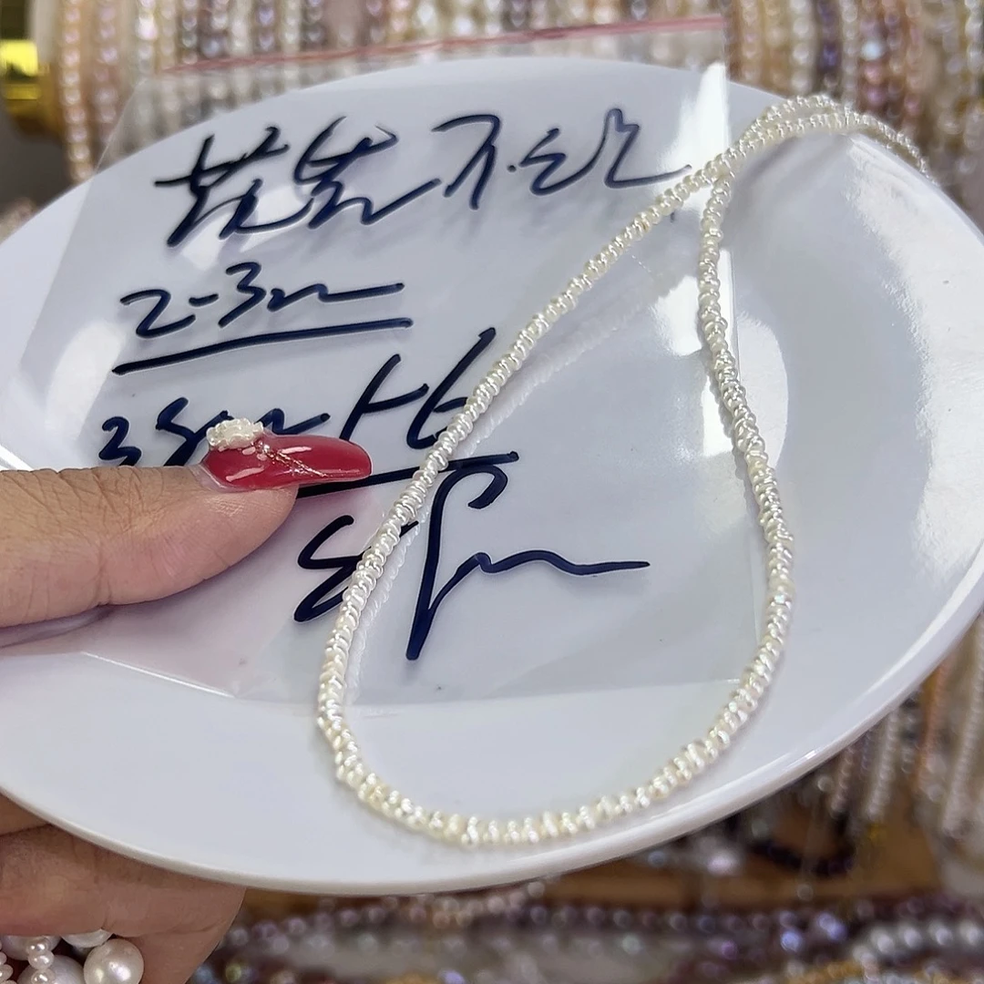 花***花手绳淡水珍珠钛钢