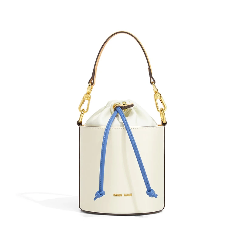 牛皮米白拼蓝绳质感水桶包撞色抽绳设计轻松提升造型感9087