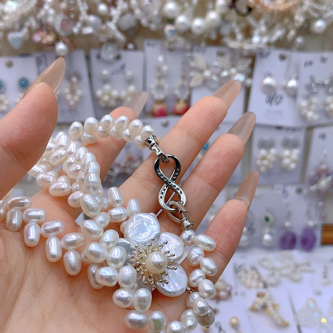 银S925镶嵌淡水珍珠耳饰活**己