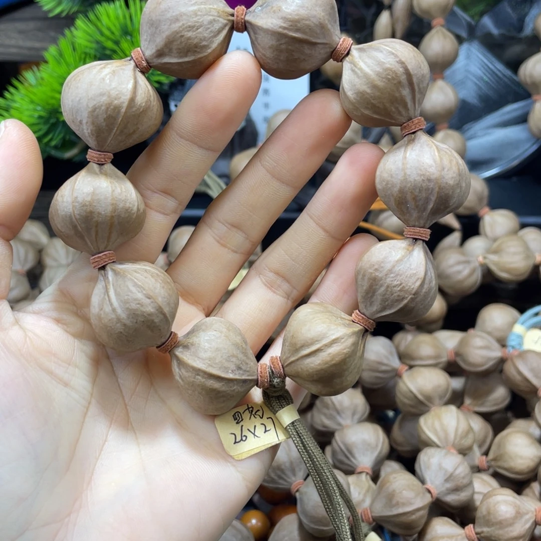 @***。橄榄核吊坠2627四花铁核
