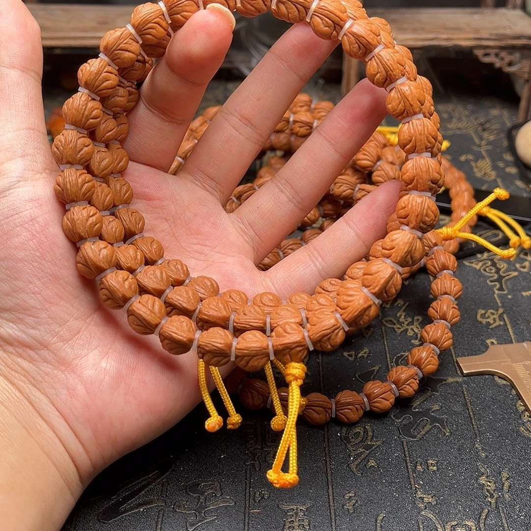 桃核吊坠玉龙手持