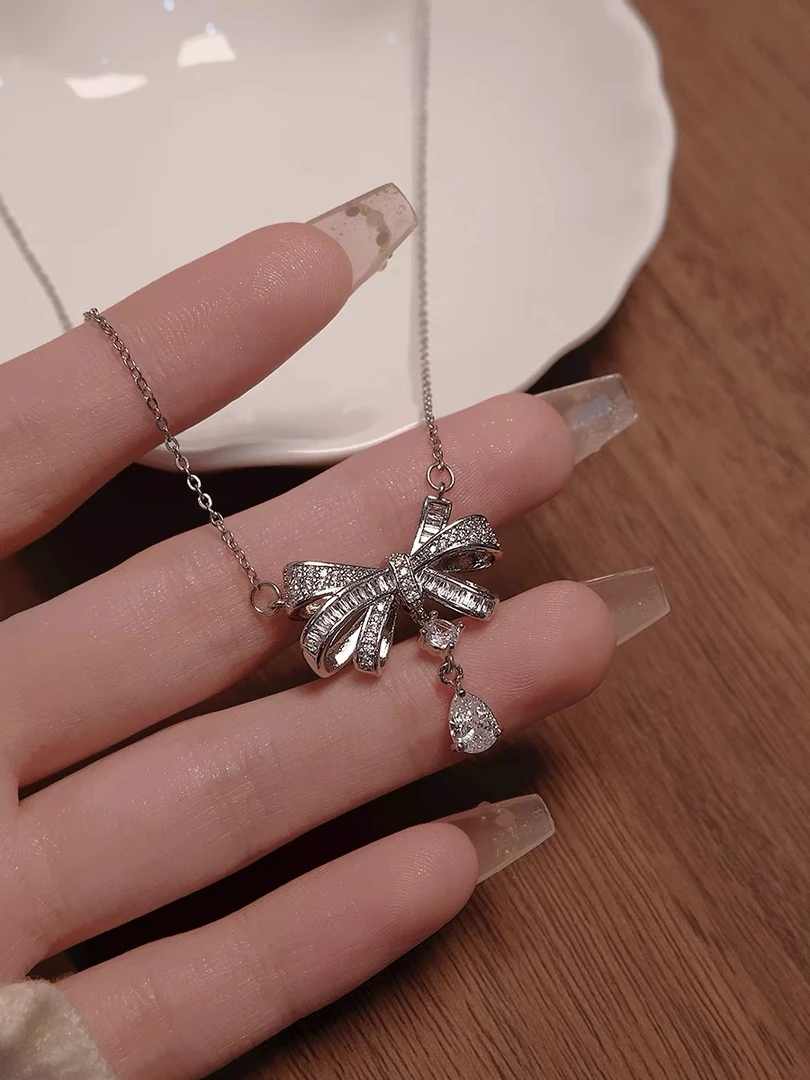 PT950项链蝴蝶结吊坠女夏高级c25