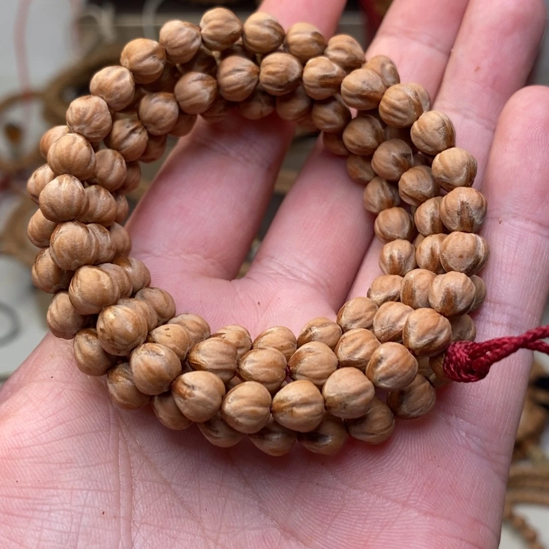 朱***宅柏香籽/百香籽吊坠