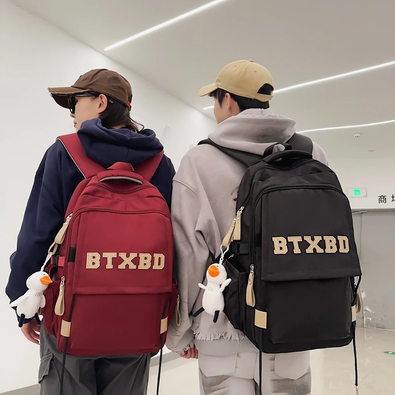 B01-B100编号新款学生双肩包旅行包包男士双休闲大学生健身包