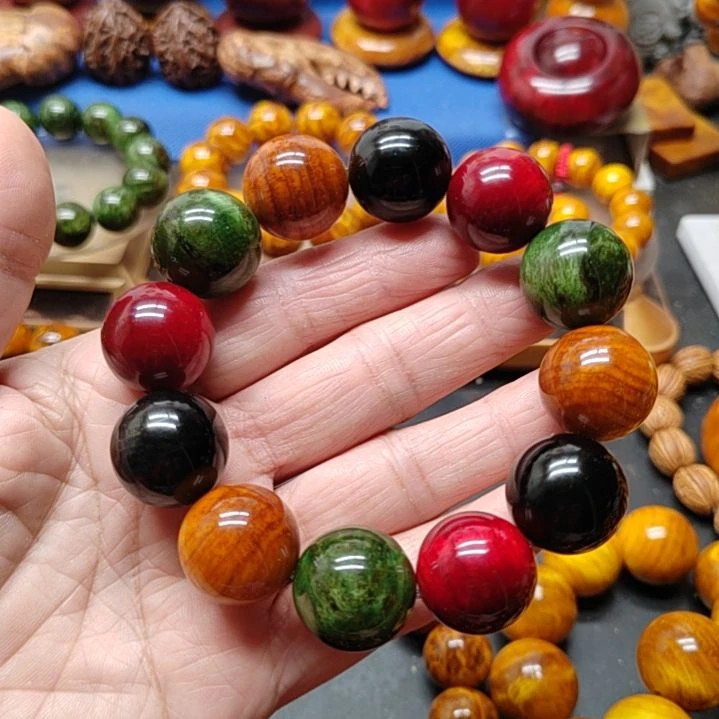 松木李****拿琥珀木手串多宝珠1.8尺寸