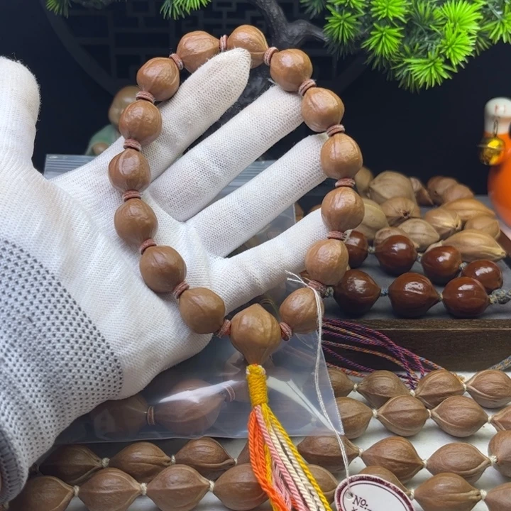 夏***夜手串/手链橄榄核1.5*1.8原皮三花铁核