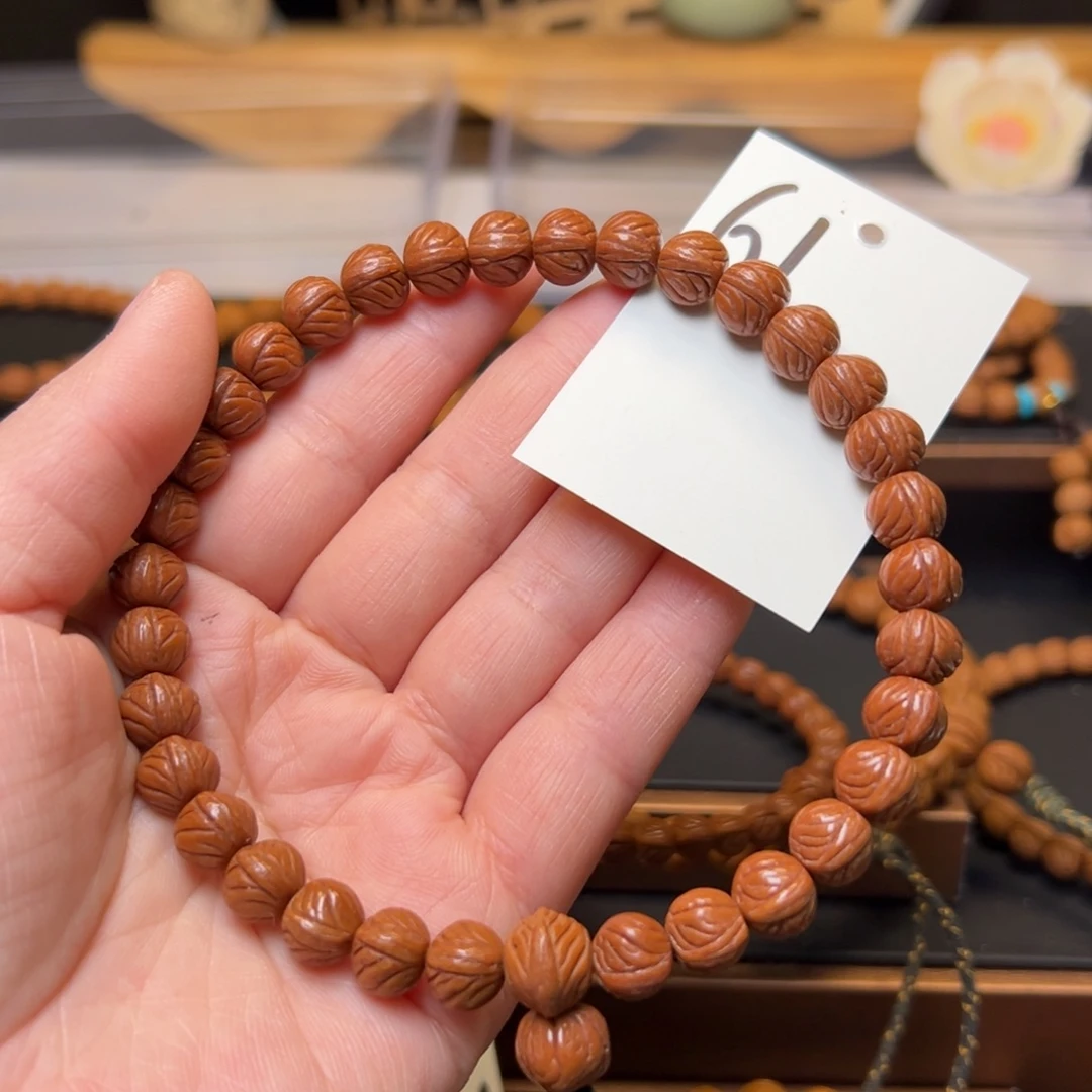 摸***贼文玩核桃把件秦岭龙纹桃核9小奶豆手持