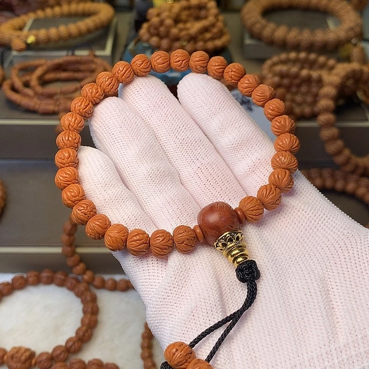 洋***哥手串桃核秦岭龙纹