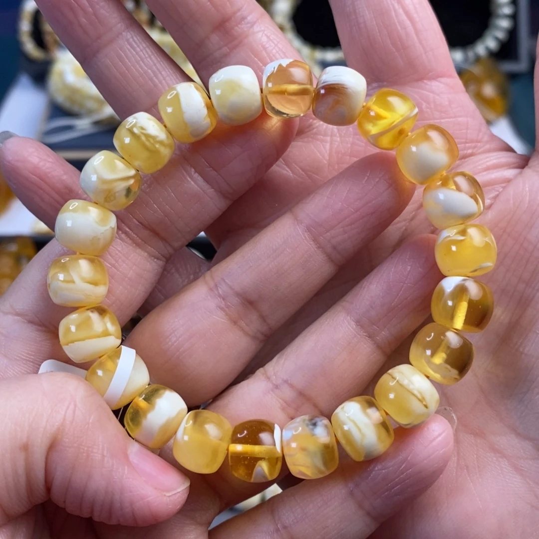 琥珀未镶嵌裸石金瓷白溶洞妖花极限弧手串10.4