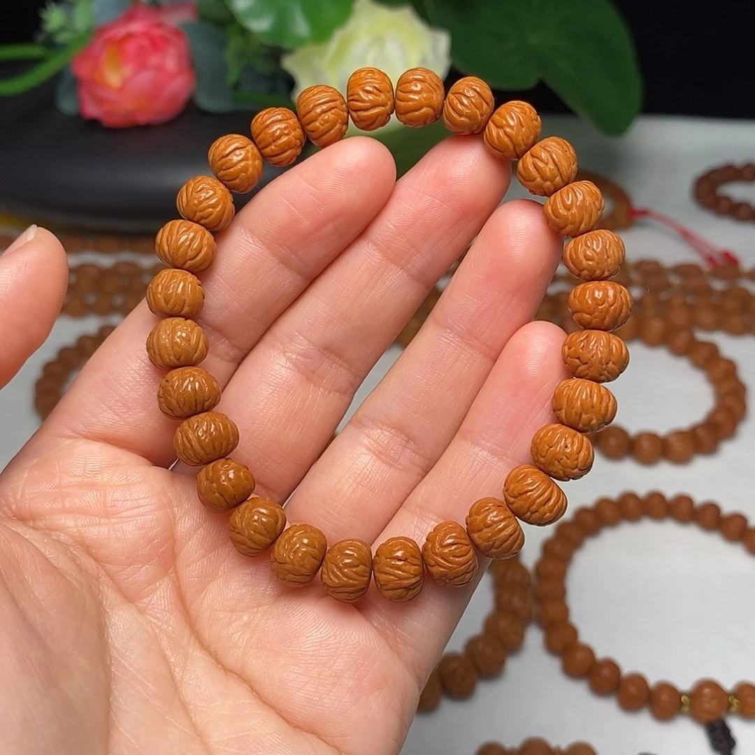 桃核手串9.5mm野生凤羽聚宝盆桃核手串