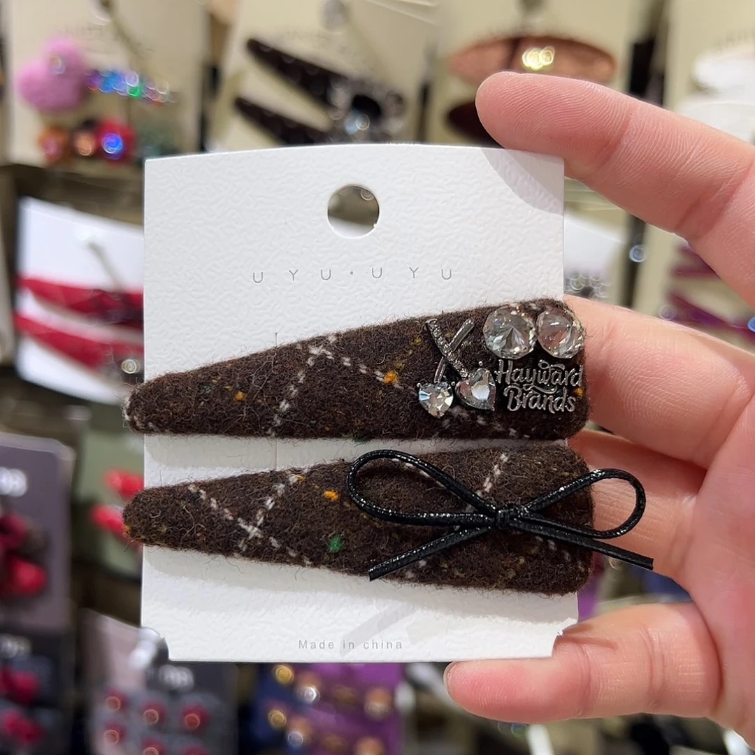 布艺非金属咖色蝴蝶结拜拜夹