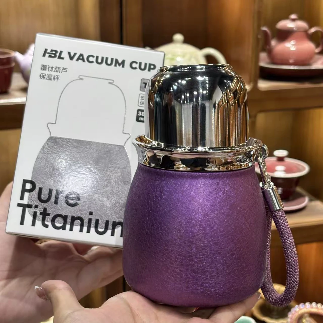 当代陶瓷紫色覆肽葫芦保温杯 A13924