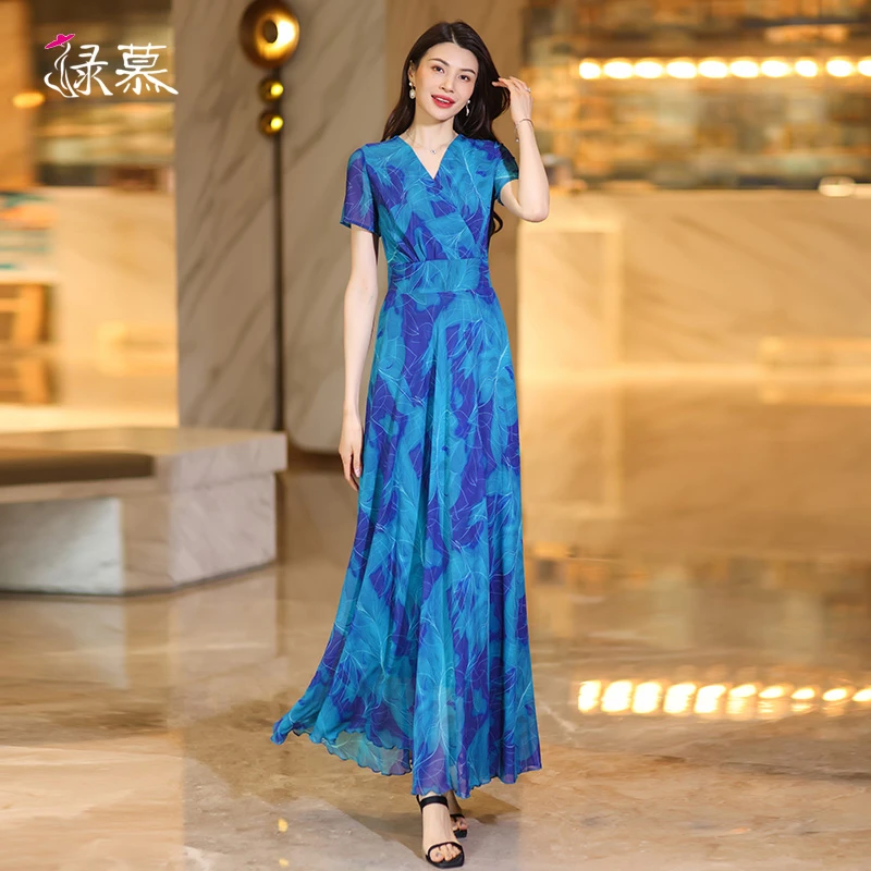 蓝色连衣裙长款2025新款轻奢高级感气质显瘦连身裙女夏碎花长裙