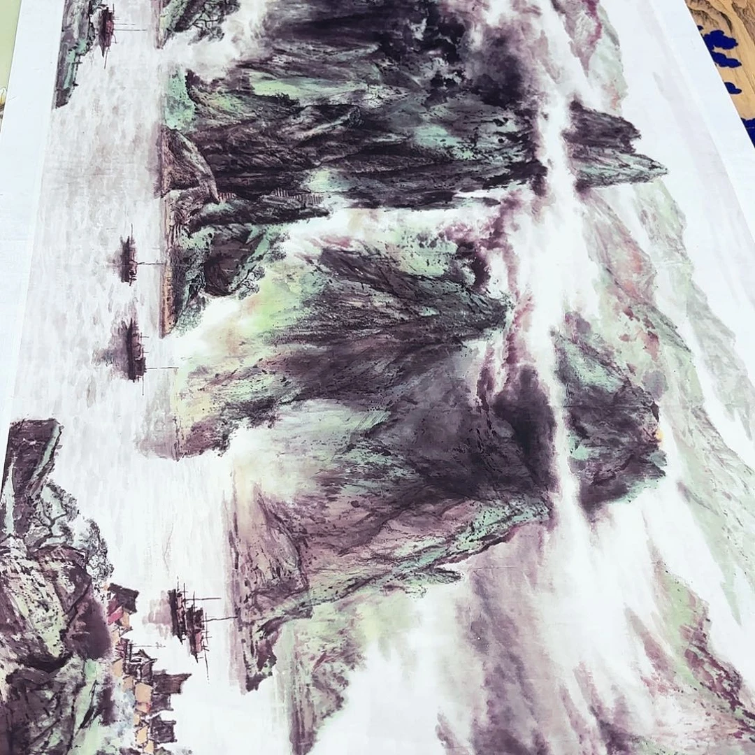 一个钢镚换字画年画