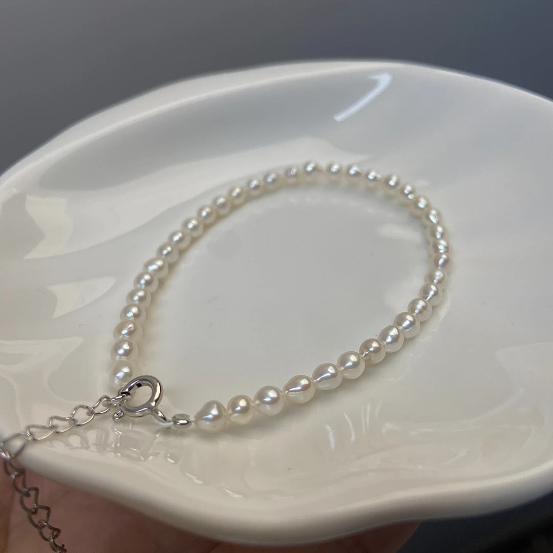 625 米形3-4mm天然小米珠手链极强光微瑕可调节可刮粉