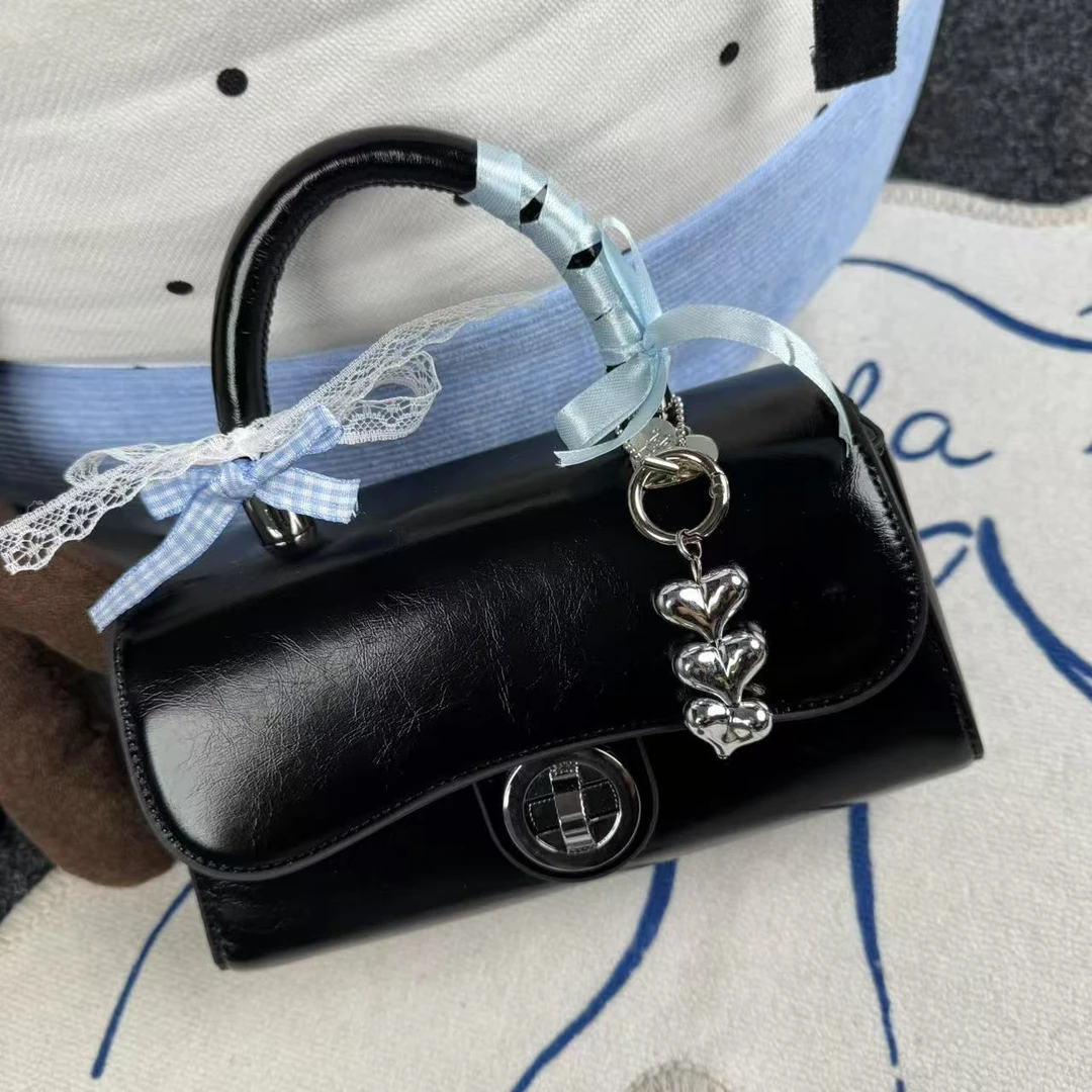 一张同学【长约20宽7高11单位厘米】时尚手提单肩斜跨包C4386黑色