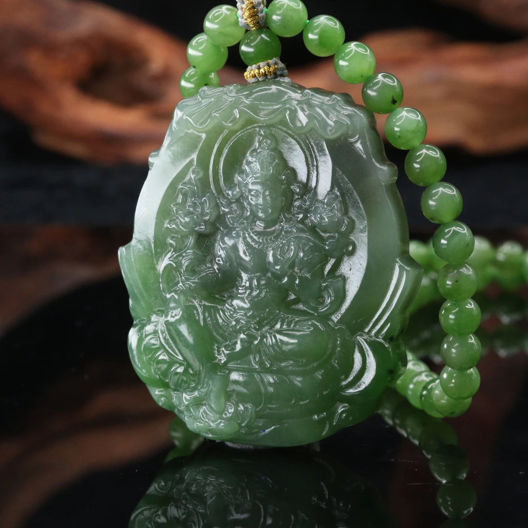 12和田玉碧玉自在观音/400817上海嘉禾拍卖