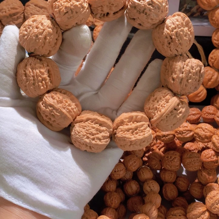 S***龍文玩核桃手串白狮子