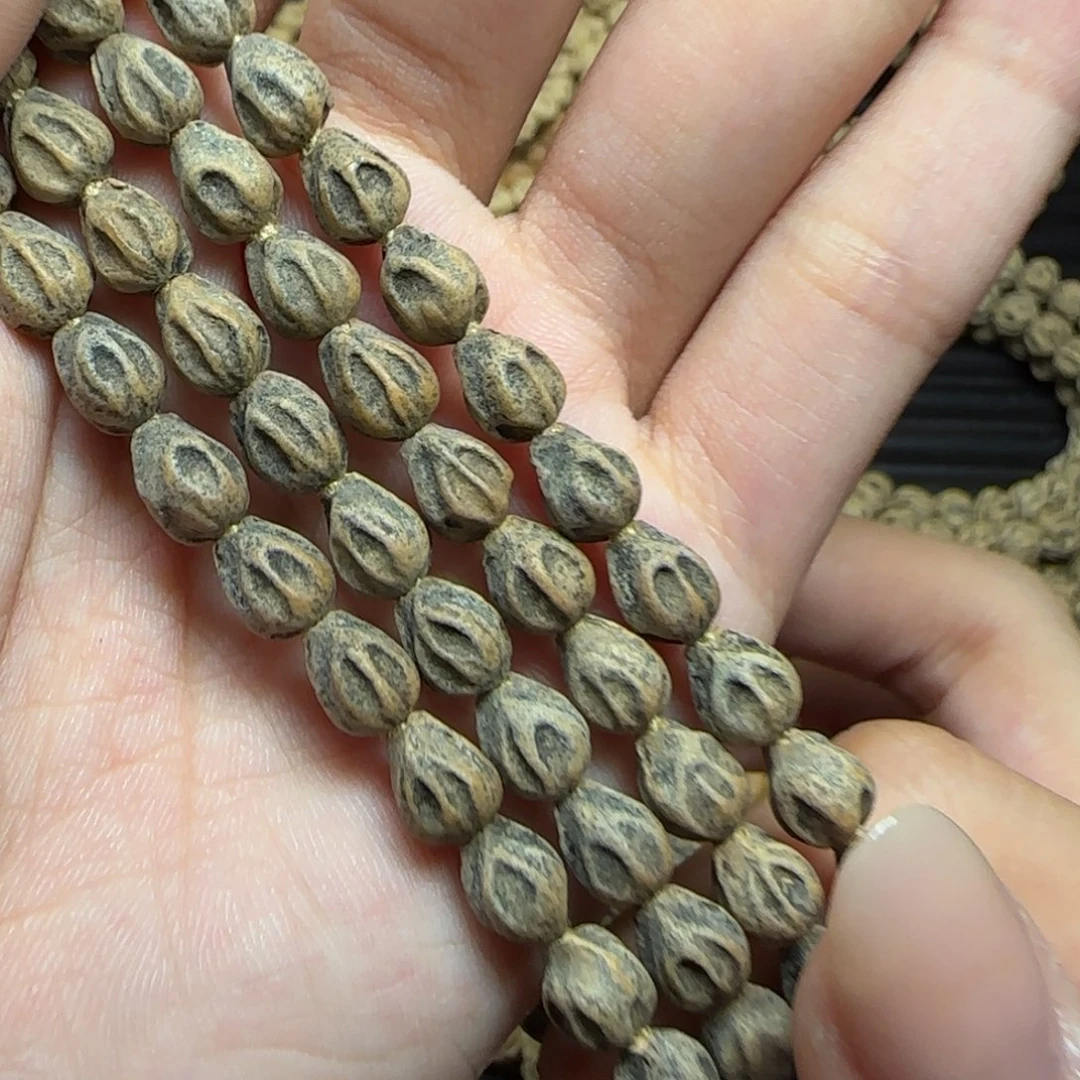 爱***己柏香籽/百香籽吊坠