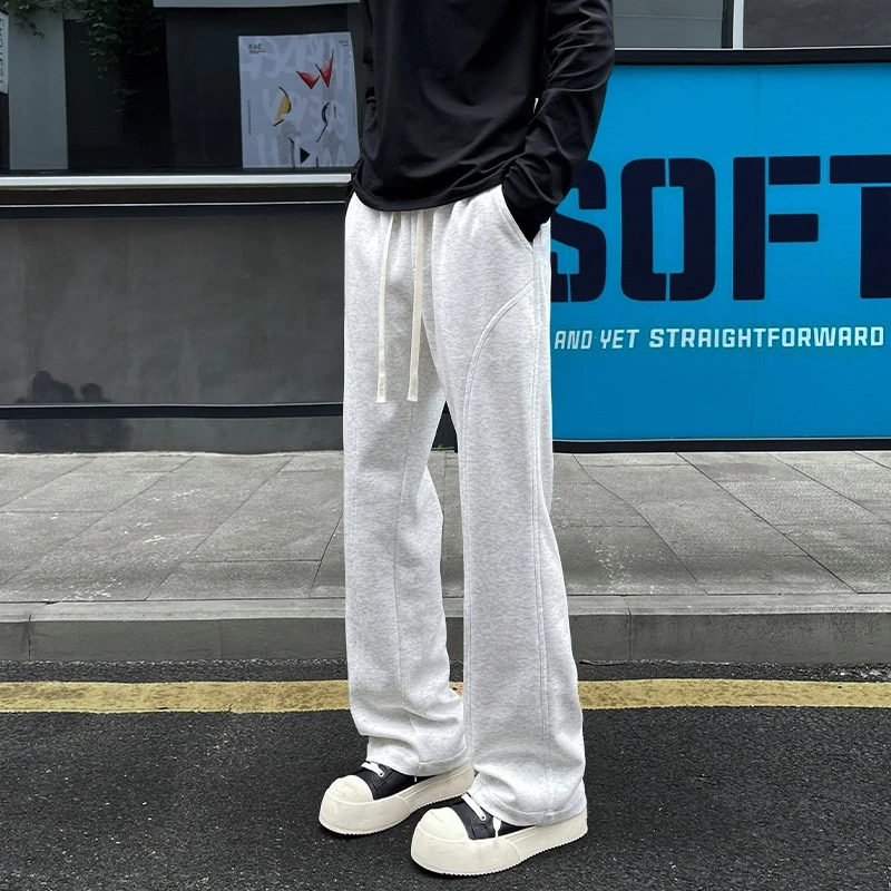 浅灰色斜切微喇卫裤男女同款美式复古cleanfit裤子弯刀假两件卫衣