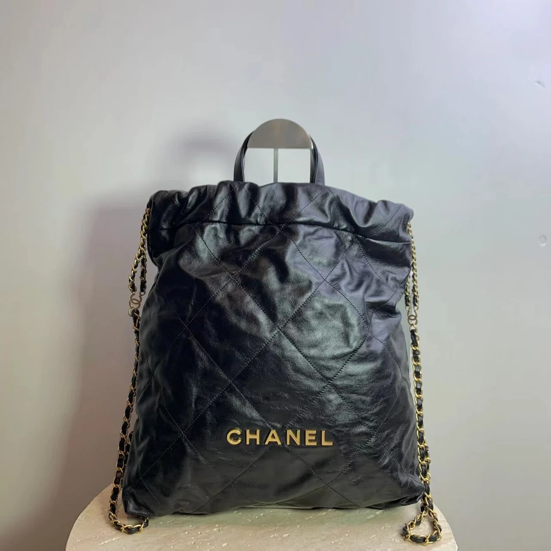 99新 Chanel/香奈儿 壹臻/22s黑金牛22bag双肩包大号 70579886